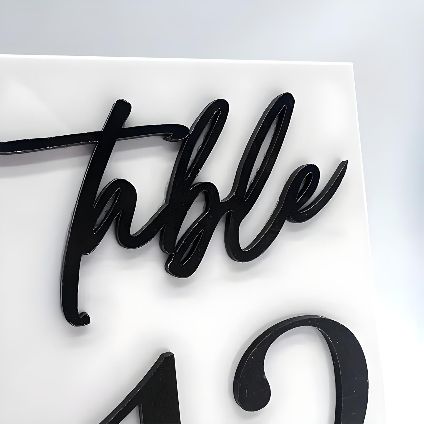 Elevated acrylic table numbers detail - Picture Perfect Rentals
