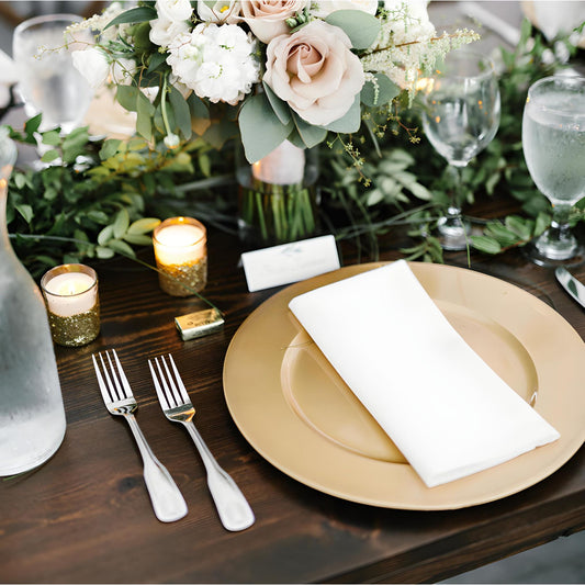 Gold Chargers at a decorated place setting - Picture Perfect Rentals Wedding and Event Rental Decor in Wichita Ks