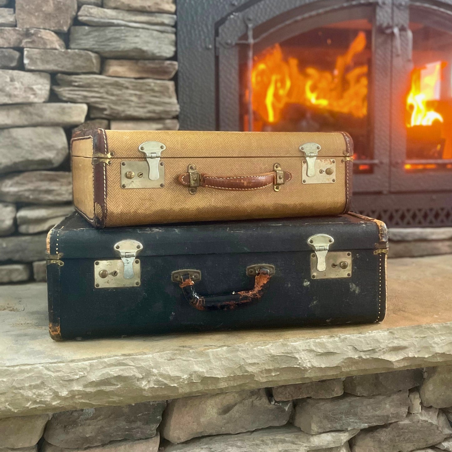 Black and brown rectangle vintage suitcases for decor rentals - Picture Perfect Rentals