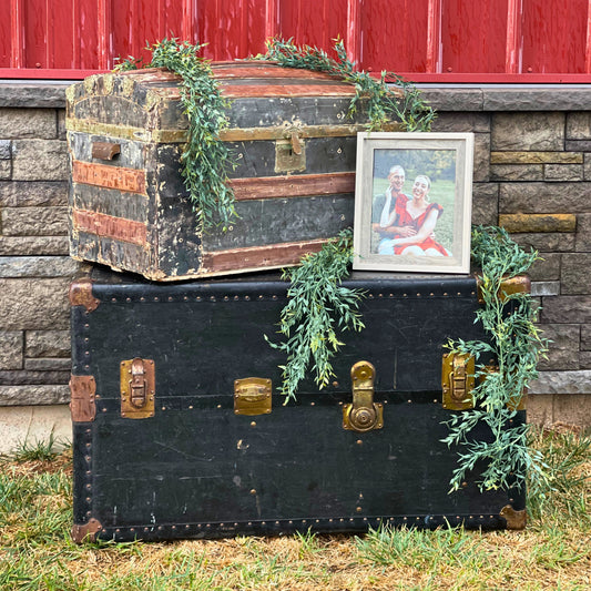 Old Steamer Trunks styled for a bridal shower or wedding decor rental - Picture Perfect Rentals
