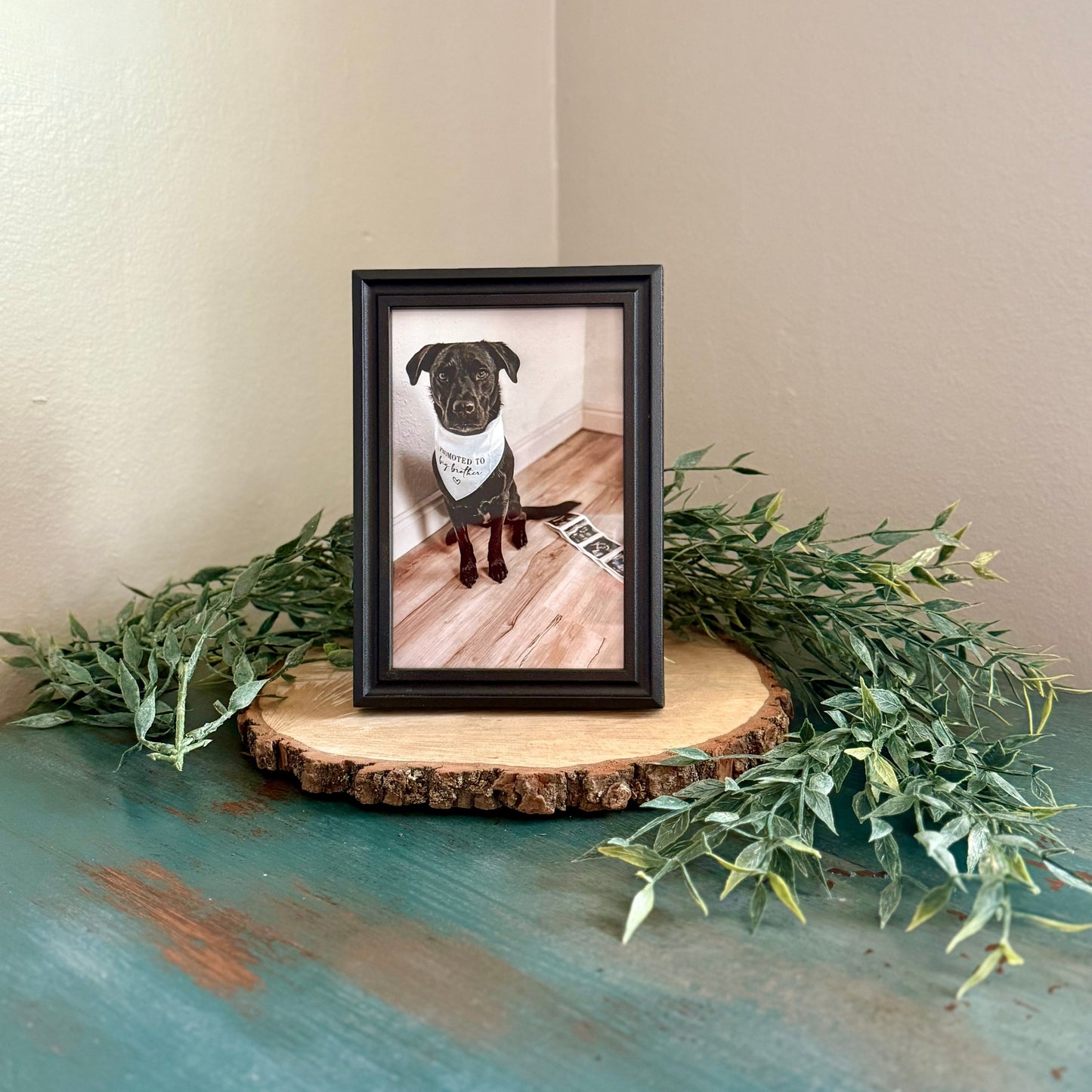 Black Picture Frame with Italian Ruscus Garland and Wood Round - Picture Perfect Rentals Wichita, KS Tabletop Decor Rentals