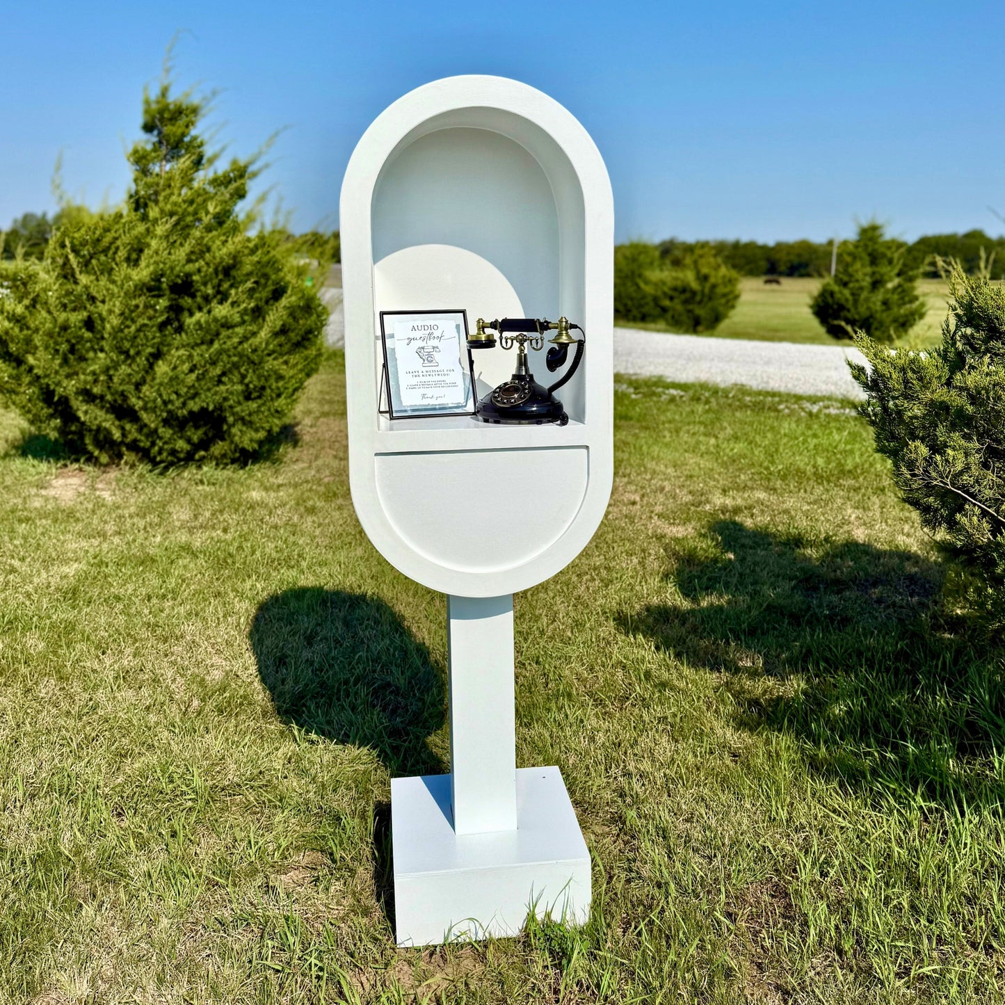 White wood phone booth stand for an audio guest book rental - Picture Perfect Rentals audio guestbook for rent in Wichita, KS