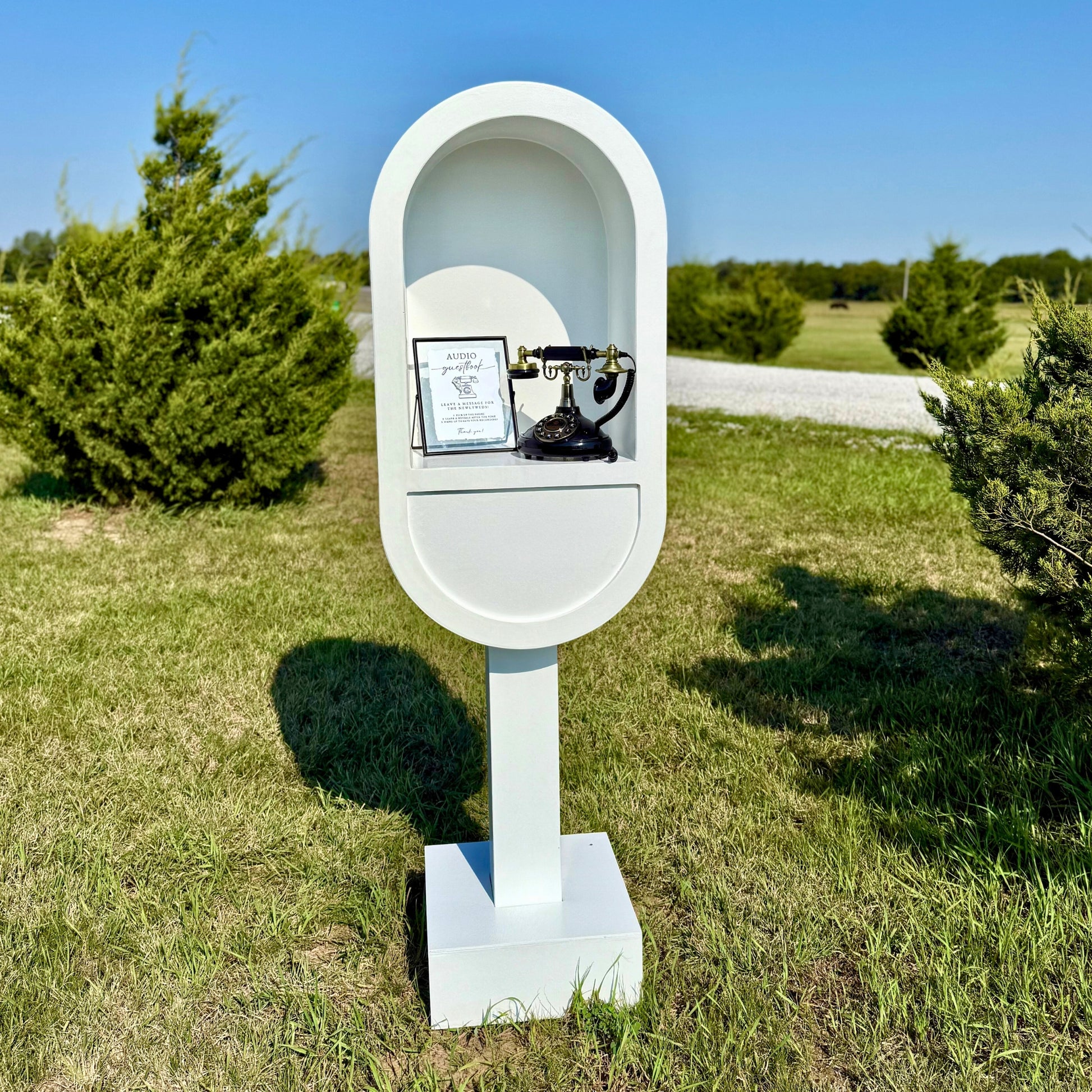 White wood phone booth stand for an audio guest book rental - Picture Perfect Rentals audio guestbook for rent in Wichita, KS
