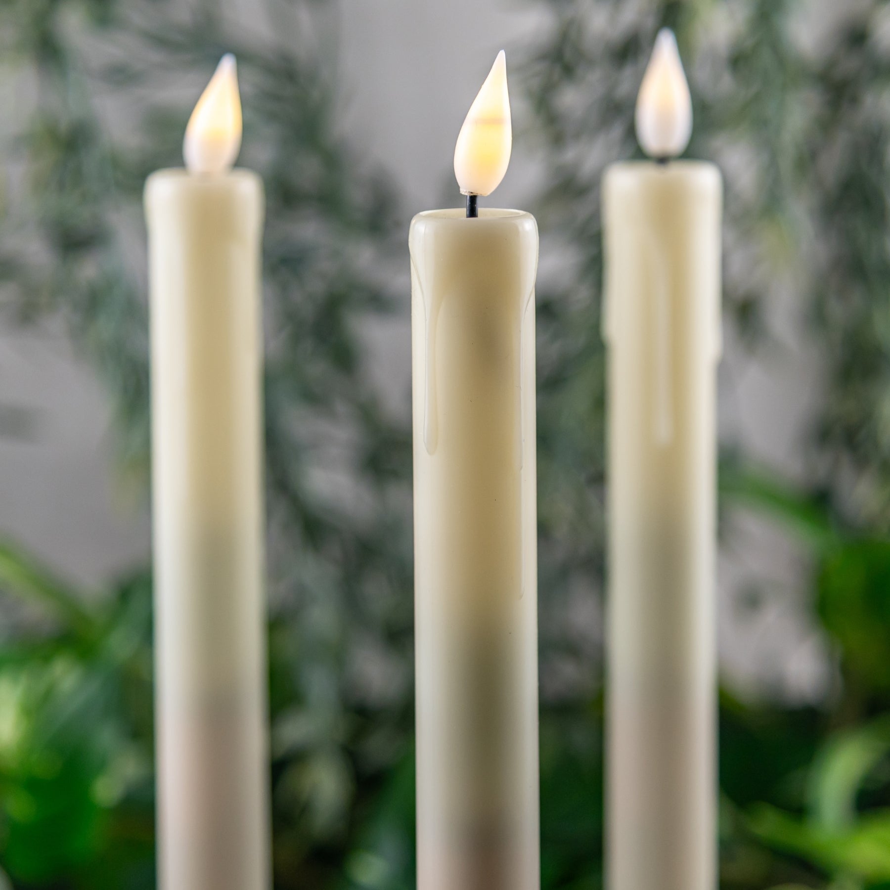 Flameless Tapered Candle wedding rentals in Wichita, Kansas. Realistic close up candle look - Picture Perfect Rentals 