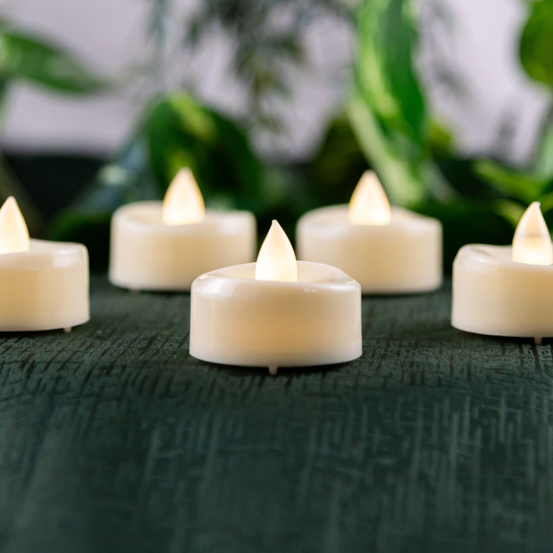 Flameless Tea Light Candle wedding rentals in Wichita, Kansas. Lower angle photo - Picture Perfect Rentals 