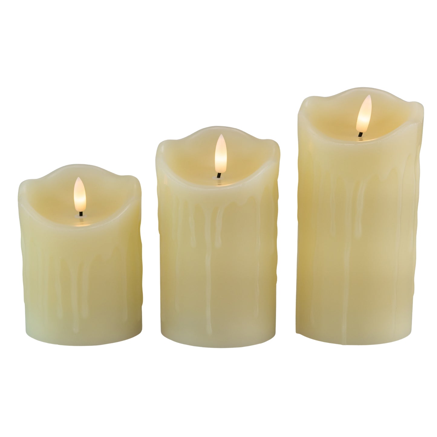 Three flameless candles of different sizes on a white background - Picture Perfect Rentals
