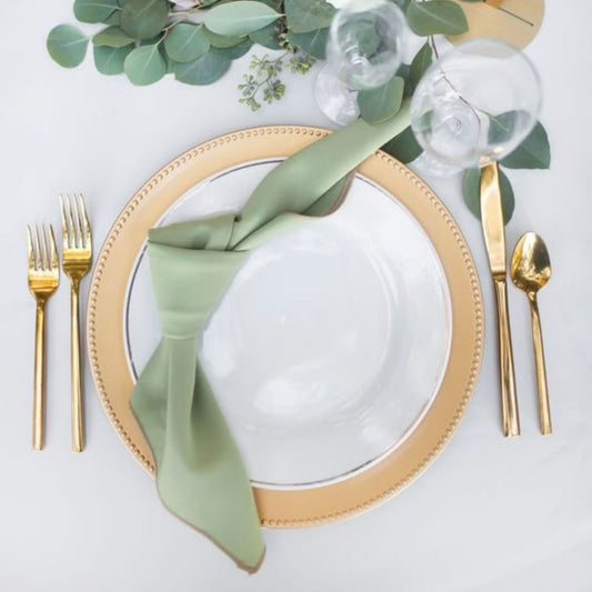 Elegant gold beaded charger for event rentals - Picture Perfect Rentals