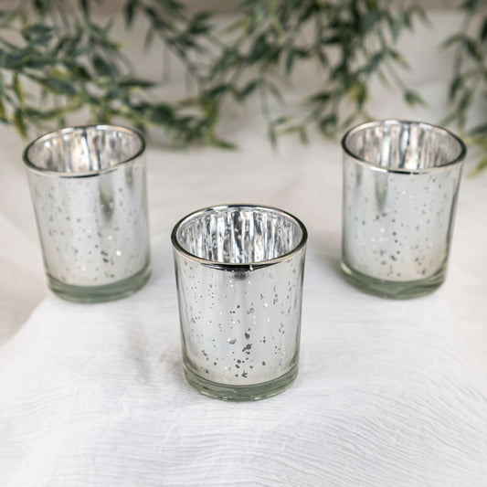 Silver Mercury Votive Holder on a white cloth, wedding rentals in Wichita, Kansas - Picture Perfect Rentals 