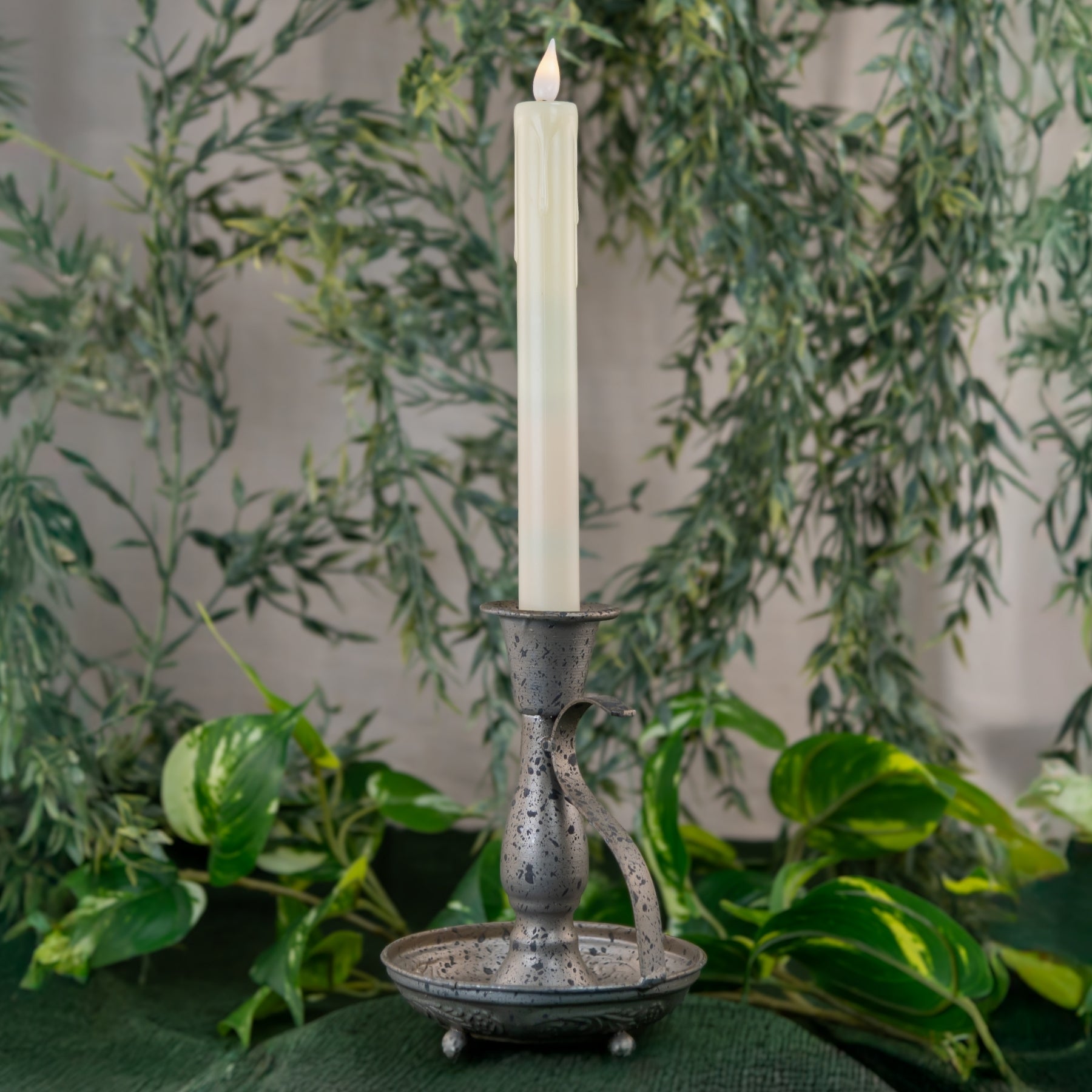 Vintage Taper Candle Holder on a green cloth, wedding rentals in Wichita, Kansas - Picture Perfect Rentals 